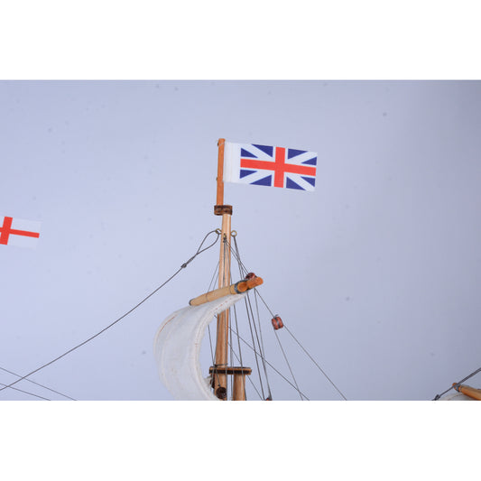British flag with wooden pole